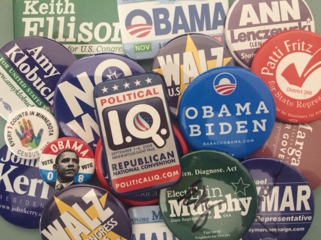 Picture of political campaign buttons.