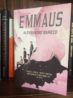 Photo of book Emmaus by Alessandro Baricco on a bookshelf.