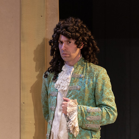 Matthew Collie dressed as Cleanté for a production of Tartuffe
